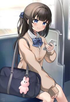 1girl animal_charm bag black_hair blue_bow blue_bowtie blue_eyes blue_ribbon blush bow bowtie brown_cardigan buttons cardigan cellphone charm_(object) closed_mouth commentary feet_out_of_frame grey_skirt hair_ribbon highres holding holding_phone long_hair long_sleeves looking_at_viewer minami_saki original phone rabbit_charm ribbon school_bag school_uniform signature sitting skirt smartphone smile solo symbol-only_commentary train_interior