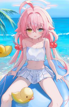 1girl absurdres ahoge bare_legs beach beads bikini bikini_skirt blue_archive blush breasts chii_(k_ung) collarbone commentary crossed_bangs feet_out_of_frame frilled_bikini frills hair_beads hair_flaps hair_ornament halo heterochromia highres horizon hoshino_(blue_archive) hoshino_(swimsuit)_(blue_archive) long_hair looking_at_viewer navel official_alternate_costume outdoors palm_leaf pink_hair revision rubber_duck sitting small_breasts solo stomach strap_slip swimsuit twintails very_long_hair white_bikini