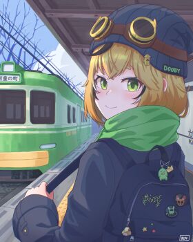 1girl artist_name backpack bag bare_tree beanie black_bag black_hat black_jacket black_streaks blonde_hair bubba_(watson_amelia) bubbles_(dooby) charm_(object) closed_mouth cloud commentary day dooby dooby_(jerboa) english_commentary from_behind goggles goggles_on_headwear green_eyes green_scarf hair_ornament hat highres holding_strap indie_virtual_youtuber jacket kippu_(dooby) long_sleeves looking_at_viewer looking_back mikeemyk1 multicolored_hair outdoors railroad_tracks scarf short_hair sky smile solo streaked_hair train train_station tree turning_head upper_body virtual_youtuber white_streaks zipper_pull_tab