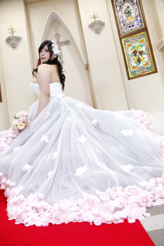 1girl asian black_hair breasts bride chouzuki_maryou cleavage dress highres lipstick makeup photo_(medium) plump solo wedding_dress