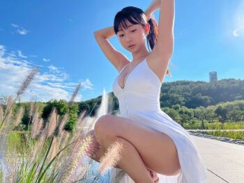 1girl armpits arms_behind_head asian black_hair breasts brown_eyes cover dress eunji_(jung_hye-rim) female_focus korean medium_breasts model outdoors photo_(medium) real_life squatting thighs white_dress