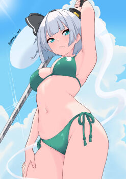 1girl absurdres bikini black_hairband blue_sky blunt_bangs breasts cleavage closed_mouth cloud commentary ghost green_bikini green_eyes grey_hair hairband highres holding holding_behind_back holding_sword holding_sword_behind_back holding_weapon holding_weapon_behind_back konpaku_youmu konpaku_youmu_(ghost) looking_at_viewer medium_breasts navel outdoors pamu_art short_hair side-tie_bikini_bottom sky solo swimsuit sword symbol-only_commentary touhou twitter_username weapon