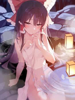 1girl 25omega25 bathing blush bow breasts brown_eyes brown_hair closed_mouth collarbone commentary_request frilled_bow frilled_hair_tubes frills groin hair_bow hair_tubes hakurei_reimu highres long_hair looking_at_viewer medium_breasts naked_towel onsen partially_submerged red_bow sitting solo touhou towel water