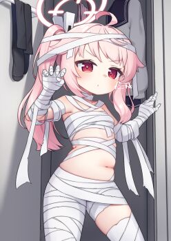 1girl ahoge artist_name asymmetrical_hair bandages blue_archive breasts claw_pose closed_mouth commentary_request cowboy_shot dot_mouth halo hands_up highres kokone_(coconeeeco) loli long_hair naked_bandage natsu_(blue_archive) navel paid_reward_available pink_hair pink_halo red_eyes side_ponytail signature small_breasts solo