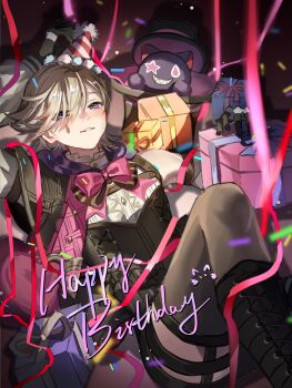 1boy black_boots black_gloves blah_haohao boots box brown_hair commentary confetti facial_mark genshin_impact gift gift_box gloves happy_birthday hat highres long_sleeves looking_at_viewer lyney_(genshin_impact) male_focus multiple_thigh_straps party_hat purple_eyes smile symbol-only_commentary thigh_strap