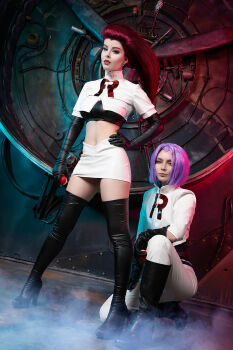 1boy 1girl black_undershirt blue_eyes boots breasts cable cosplay crop_top earrings hand_on_own_hip helly_von_valentine_(disharmonica) high_heel_boots high_heels highres indoors james_(pokemon) james_(pokemon)_(cosplay) jessie_(pokemon) jessie_(pokemon)_(cosplay) jewelry kneeling large_breasts leather leather_boots lipstick long_hair looking_at_viewer makeup midriff navel nero_(asaginanami) nintendo pants pencil_skirt photo_(medium) poke_ball poke_ball_(basic) pokemon pokemon_(anime) purple_hair real_life red_hair shirt skirt smile team_rocket team_rocket_uniform thick_thighs thigh_boots thighhighs thighs undershirt warehouse white_pants white_shirt white_skirt zipper_top
