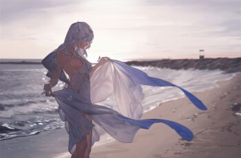 1girl absurdres armlet beach blue_hair blurry blurry_background breasts clothes_lift commentary dress english_commentary from_side highres jewelry large_breasts long_hair lufi_ays outdoors rock sand shore shorekeeper_(wuthering_waves) sideboob silver_armlet skirt skirt_lift solo standing veil water white_dress white_veil wuthering_waves