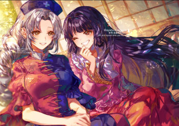 2girls ;d ayatsuki_sugure black_hair blue_hat blush braid braided_ponytail breasts commentary_request cross cross_print curtained_hair dress frilled_sleeves frills grey_hair hat highres houraisan_kaguya long_hair medium_breasts multiple_girls nurse_cap one_eye_closed open_mouth pink_skirt sitting skirt smile split-color_clothes straight_hair touhou twitter_username two-tone_dress very_long_hair yagokoro_eirin