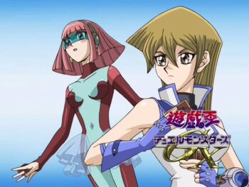 00s 2girls anime_screenshot aqua_bodysuit black_hairband blonde_hair blue_eyes blue_visor blunt_ends blush_stickers bodysuit breasts brown_eyes card covered_navel curvy cyber_tutu duel_academy_uniform_(yu-gi-oh!_gx) duel_disk duel_monster eyecatch fingerless_gloves floating gloves hair_between_eyes hairband highres large_breasts logo long_hair looking_ahead medium_breasts medium_hair multiple_girls non-web_source obelisk_blue_uniform pink_hair playing_card ryona shiny_skin simple_background tenjouin_asuka tutu visor_(armor) wide_hips yu-gi-oh! yu-gi-oh!_gx