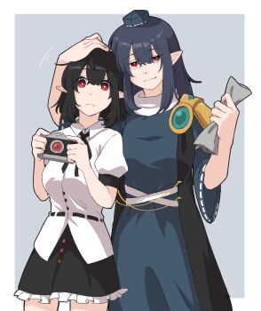 2girls black_hair black_skirt blue_background blue_dress bright_pupils camera closed_mouth dress expressionless hair_between_eyes hand_on_another's_head hat head_hug highres holding holding_camera holding_paper iizunamaru_megumu long_hair looking_at_viewer medium_hair min.k multiple_girls paper pointy_ears red_eyes shameimaru_aya shirt short_sleeves skirt smile tokin_hat touhou white_pupils white_shirt