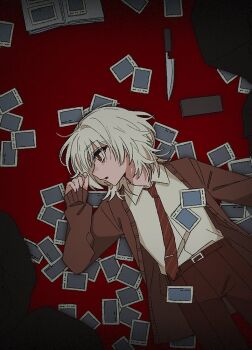 Rule 34 | 1boy, belt, brown belt, brown cardigan, brown eyes, brown necktie, brown pants, cardigan, collared shirt, cowboy shot, dress shirt, dutch angle, hand up, hashtag-only commentary, knife, legs apart, lying, male focus, necktie, on back, pants, parted lips, polaroid photo, profile, red background, saihate eki, shirt, solo, tatsunami shion, white hair, white shirt, ze no crime