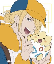 Rule 34 | 1boy, :d, blonde hair, blue jumpsuit, commentary request, creatures (company), game freak, gen 2 pokemon, grey eyes, hair bun, hair over one eye, hands up, happy, hat, highres, holding, holding pokemon, jumpsuit, long sleeves, male focus, mocollie, nintendo, open mouth, pokemon, pokemon (creature), pokemon legends: arceus, smile, teeth, togepi, tongue, upper teeth only, volo (pokemon), white background, yellow hat