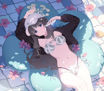 1girl absurdres alternate_costume bikini black_hair blue_archive blush bow breasts closed_mouth commentary_request dong_ji flower from_above halo highres innertube layered_bikini long_hair long_sleeves looking_at_viewer lying medium_breasts navel on_back pool smile solo swim_ring swimsuit tsumugi_(blue_archive) water
