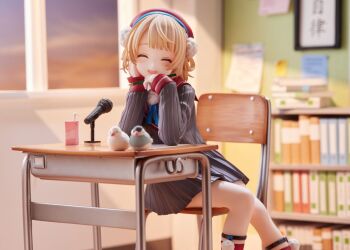 1girl 3d bird blue_hat blurry blurry_background bookshelf chair classroom desk drink_carton facing_viewer figure figure_(medium) hat indie_virtual_youtuber juice_box photo_(medium) red_hat school_uniform shigure_ui_(1st_costume)_(vtuber) shigure_ui_(vtuber) sitting smile solo virtual_youtuber window