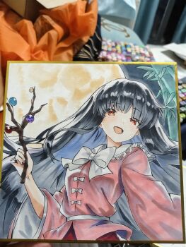 Rule 34 | 1girl, bamboo, black hair, bow, bowtie, branch, chinese commentary, collared shirt, commentary request, frilled shirt collar, frills, full moon, highres, houraisan kaguya, jeweled branch of hourai, l0e9s29p, long hair, long sleeves, looking at viewer, moon, photo (medium), pink shirt, red eyes, red skirt, shikishi, shirt, skirt, smile, solo, touhou, traditional media, very long hair, white bow, white bowtie, wide sleeves
