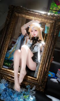 1girl arm_up artist_request blonde_hair blue_eyes book cartethyia_(wuthering_waves) cosplay day feet hair_ornament highres pantyhose poin pointy_ears portrait_(object) real_life sitting wuthering_waves