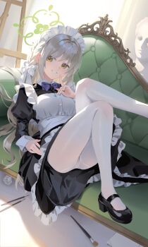 absurdres alternate_costume apron black_dress black_shoes blue_archive blush bow brown_eyes chinese_commentary clothes_lift commentary_request couch dress green_halo grey_hair halo highres long_hair looking_to_the_side maid maid_apron maid_headdress miyo_(blue_archive) on_couch pantyhose parted_lips purple_bow shoes shortofsugar skirt skirt_lift smile white_pantyhose