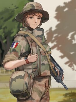 1girl absurdres assault_rifle bandaid bandaid_on_face blurry blurry_background brown_eyes brown_hair bulletproof_vest bullpup camouflage camouflage_hat camouflage_jacket camouflage_pants closed_mouth combat_helmet commentary commission cowboy_shot english_commentary famas flag_patch french_flag goggles goggles_on_headwear gorget gun gun_sling helmet highres holding holding_gun holding_weapon jacket light_smile looking_at_viewer notfuji original pants rifle short_hair sleeves_rolled_up solo unworn_goggles unworn_headwear unworn_helmet watch weapon wristwatch