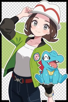 1girl bell-bottoms belt blue_pants blush breasts brown_hair closed_mouth collarbone commentary_request fangs gen_2_pokemon green_jacket grey_eyes harmony_(pokemon) hat highres jacket long_sleeves mega_ring nintendo odorukaminoke open_clothes open_jacket open_mouth pants pokemon pokemon_(creature) pokemon_legends:_z-a red_belt sharp_teeth shirt short_hair smile striped_hat tail teeth totodile white_hat white_shirt
