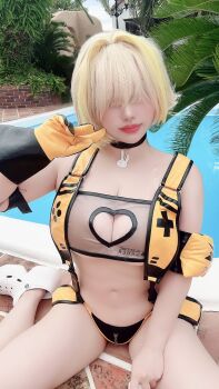 1girl absurdres animal_print blonde_hair breasts choker cleavage clothing_cutout cosplay cosplay_photo crocs elegg_(nikke) female_focus floaty gloves goddess_of_victory:_nikke hair_between_eyes heart_cutout highres japanese_(nationality) navel outdoors photo_(medium) pool poolside rabbit_print real_life saku93 short_hair solo swimsuit tree