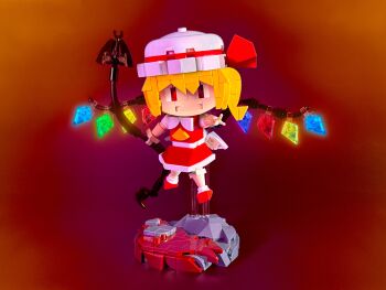 Rule 34 | 1girl, absurdres, ascot, back bow, blonde hair, bloomers, bow, commentary, crystal, english commentary, flandre scarlet, full body, glowing, glowing wings, gradient background, hat, hat ribbon, head tilt, highres, holding, holding polearm, holding weapon, laevatein (touhou), lavishlump, lego (medium), looking at viewer, medium hair, mob cap, multicolored wings, one side up, open mouth, polearm, red background, red eyes, red footwear, red ribbon, red skirt, red theme, red vest, ribbon, shirt, short sleeves, simple background, skirt, skirt set, socks, solo, touhou, unconventional media, underwear, vest, weapon, white bloomers, white bow, white hat, white shirt, white socks, wings, yellow ascot