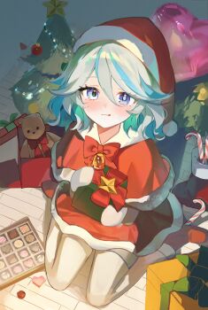 1girl bell blue_eyes boots bow box box_of_chocolates capelet chocolate christmas_present christmas_tree closed_mouth commentary dress drop-shaped_pupils full_body furina_(genshin_impact) genshin_impact gift gift_box hat heart highres long_sleeves looking_at_viewer mittens multicolored_hair red_boots red_bow red_capelet red_dress sa_mhe santa_costume santa_hat short_hair sitting smile star_(symbol) stuffed_animal stuffed_toy symbol-shaped_pupils teddy_bear thighhighs untranslatable_commentary wariza white_boots white_hair white_mittens white_thighhighs wide_sleeves