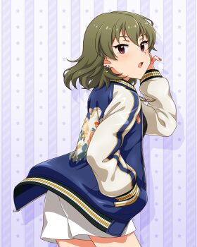 1girl commentary_request cowboy_shot drop_shadow earrings floating_hair from_behind game_cg green_eyes hand_up idolmaster idolmaster_million_live! idolmaster_million_live!_theater_days jacket jewelry letterman_jacket long_sleeves looking_back medium_hair nagayoshi_subaru official_alternate_costume official_art open_mouth red_eyes shorts solo standing sukajan_gyarus_(idolmaster) third-party_source white_shorts