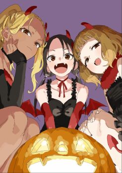 3girls black_dress black_hair blonde_hair brown_eyes brown_hair collarbone commentary_request dark-skinned_female dark_skin demon_horns demon_wings dress fake_horns fangs frilled_dress frills halloween highres himemiya_yuki horns ichinose_karina jack-o&#039;-lantern long_hair low_twintails manemane_nichinichi multiple_girls nagisa_akane nail_polish neck_ribbon open_mouth orange_nails pumpkin purple_background red_horns red_ribbon red_wings ribbon short_hair simple_background squatting twintails wings yamamoto_souichirou