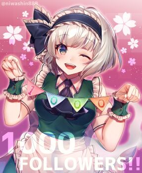 1girl apron ascot black_ascot black_bow black_hairband black_ribbon blue_eyes blush bow female_focus frilled_cuffs green_shirt hairband highres holding holding_string konpaku_youmu konpaku_youmu_(ghost) nail_polish niwashi_(yuyu) one_eye_closed pink_nails puffy_short_sleeves puffy_sleeves ribbon round_teeth shirt short_hair short_sleeves silver_hair smile solo string string_of_flags teeth touhou twitter_username upper_body waist_apron wrist_cuffs