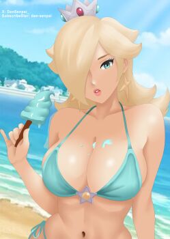 1girl beach bikini blonde_hair blue_bikini breasts brooch cleavage cloud collarbone crown curvy dansenpai food hair_over_one_eye highres holding holding_food holding_ice_cream ice_cream jewelry large_breasts light_rays long_hair looking_at_viewer mario_(series) navel nintendo ocean one_eye_covered parted_lips rosalina rosalina_(swimwear) sand seductive_gaze side-tie_bikini_bottom sky standing star_brooch sunbeam sunlight super_mario_galaxy swimsuit teeth thong_bikini toned upper_teeth_only water