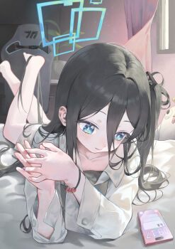 1girl absurdly_long_hair absurdres aqua_halo aris_(blue_archive) black_hair blue_archive blue_eyes blue_halo cellphone closed_mouth hair_between_eyes halo highres light_smile long_hair long_hair_between_eyes lying merong_(sou47897) one_side_up phone rectangular_halo ringed_eyes smartphone solo very_long_hair