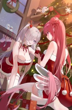 2girls blue_eyes breasts character_doll christmas christmas_present christmas_tree cinderella_(nikke) cleavage commander_(nikke) commentary crop_top doga_gyul doll doro_(nikke) dorothy_(nikke) dress gift goddess_of_victory:_nikke hair_bun highres indoors large_breasts leaning_forward long_hair multiple_girls pink_hair purple_eyes red_skirt red_socks santa_costume santa_dress single_side_bun skirt smile socks symbol-only_commentary thighhighs twintails very_long_hair white_thighhighs zettai_ryouiki