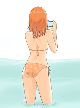 1girl ass bikini cellphone commentary_request from_behind holding holding_phone long_hair love_live! love_live!_superstar!! nonaka_kokoro orange_bikini orange_hair phone polka_dot polka_dot_bikini shibuya_kanon shoulder_blades side-tie_bikini_bottom smartphone solo swimsuit wading water