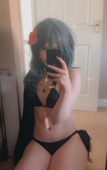 1girl bikini black_bikini blue_hair breasts female_byleth_(fire_emblem) female_byleth_(summer)_(fire_emblem) byleth_(fire_emblem)_(cosplay) cape cosplay cosplay_photo fire_emblem fire_emblem:_three_houses fire_emblem_heroes flower hair_flower hair_ornament holding holding_phone iloveballs666 indoors jewelry long_hair mirror mirror_image mirror_reflection navel necklace nintendo phone photo_(medium) selfie sitting sitting_on_lap sitting_on_person small_breasts solo swimsuit thick_thighs thighs
