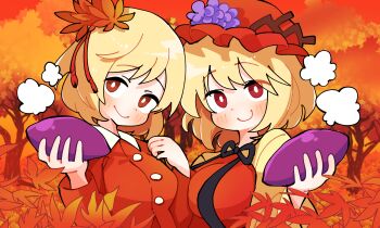 2girls aki_minoriko aki_shizuha apron autumn autumn_leaves blonde_hair breasts bright_pupils closed_mouth commentary food gram_9 hair_ornament hat highres holding holding_food leaf leaf_hair_ornament long_sleeves mob_cap multiple_girls outdoors red_apron red_eyes red_hat red_shirt shirt short_hair siblings sisters smile sweet_potato touhou upper_body white_pupils