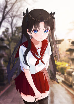 1girl absurdres arm_behind_back black_hair black_ribbon black_thighhighs blue_eyes blurry blurry_background closed_mouth commentary_request cowboy_shot earrings fate/stay_night fate_(series) hair_ribbon highres holding jewelry looking_at_viewer neckerchief pleated_skirt red_neckerchief red_sailor_collar red_skirt ribbon sailor_collar school_uniform shirt short_sleeves skirt smile solo standing thighhighs tohsaka_rin two_side_up white_shirt yuuca