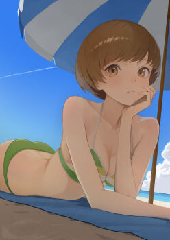 1girl ass bare_shoulders beach_umbrella bikini breasts brown_eyes brown_hair cloud collarbone highres looking_at_viewer lying ocean on_stomach persona persona_4 remo_reko23 satonaka_chie short_hair sky solo swimsuit umbrella water
