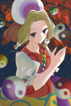 Rule 34 | 1girl, blonde hair, blunt tresses, brown hair, closed mouth, commentary request, cowboy shot, hair bobbles, hair ornament, highres, katsuragi atori, light blush, light smile, magatama, multicolored hair, orb, parted bangs, patterned clothing, puffy short sleeves, puffy sleeves, rainbow order, red eyes, red vest, sash, shirt, short hair, short sleeves, skirt, solo, tamatsukuri misumaru, touhou, twitter username, two-tone hair, vest, waist sash, white shirt, yellow skirt, yin yang, yin yang orb