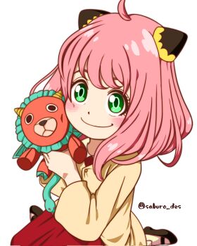 1girl ahoge anya_(spy_x_family) black_shoes blush child commentary director_chimera_(spy_x_family) eyebrows_hidden_by_hair green_eyes hairpods highres holding holding_stuffed_toy jacket medium_hair pink_hair red_skirt saburo_des shoes sitting skirt smile solo spy_x_family stuffed_animal stuffed_toy symbol-only_commentary twitter_username wariza yellow_jacket