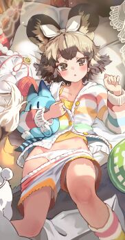 1girl absurdres african_wild_dog_(kemono_friends) animal_ear_fluff animal_ears babydoll blonde_hair blush brown_eyes brown_hair character_doll clothes_pull commentary dog_ears dog_girl dog_tail doll extra_ears groin hairband highres japari_coin kemono_friends long_sleeves looking_at_viewer lucky_beast_(kemono_friends) lying melaton open_mouth open_pajamas pajamas panties pillow short_hair short_shorts shorts shorts_pull solo standing_on_box striped_clothes striped_pajamas tail underwear white_hairband white_panties yarn yarn_ball yellow_babydoll