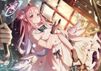 1girl 1other black_gloves blue_archive blush capelet closed_mouth commentary_request dress gloves guzangnanfeng hair_bun hand_up highres long_hair looking_at_viewer low_wings mika_(blue_archive) outdoors pink_hair single_hair_bun solo_focus white_capelet white_dress white_wings wing_ornament wings yellow_eyes