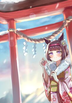 animal_ears blunt_bangs blush brown_hair closed_mouth ear_flower floral_print floral_print_kimono flower fur-trimmed_kimono fur_trim hair_flower hair_ornament hairband highres holding_omikuji horse_ears horse_girl japanese_clothes kimono looking_at_viewer new_year nishino_flower_(umamusume) obi omikuji outdoors pink_hairband pink_kimono print_kimono purple_eyes sash seoyoung7770 short_hair sky smile snow sunrise torii umamusume