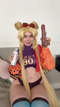 Rule 34 | 1girl, blonde hair, breasts, cosplay, curvy, dildo, double bun, green eyes, hair bun, indoors, jacket, lips, long hair, long twintails, medium breasts, musclemommycosplay, navel, one piece, open clothes, open jacket, open mouth, orange jacket, photo (medium), real life, revealing clothes, sex toy, sitting, smile, thong, vegapunk york, vegapunk york (cosplay), wide hips