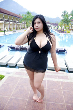 1girl asian black_hair breasts chouzuki_maryou large_breasts photo_(medium) plump solo swimsuit