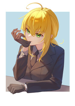 1girl ahoge antenna_hair artoria_pendragon_(fate) black_gloves black_jacket black_necktie blonde_hair blue_background border bracelet breast_pocket collared_shirt commentary english_commentary fate/zero fate_(series) formal_clothes glove_pull gloves green_eyes grey_shirt hair_between_eyes highres jacket jewelry long_hair long_sleeves looking_at_viewer mouth_hold necktie pocket ponytail saber_(fate) shirt sidelocks simple_background solo suit upper_body white_border wing_collar wujingwushi