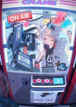 1girl absurdres animal_ears arcade arm_up black_shirt blush commentary_request computer computer_keyboard computer_tower crane_game hand_up headphones headphones_around_neck highres hoji_(hooooooooji1029) holding holding_stylus in_container jacket looking_at_viewer monitor one_eye_closed open_clothes open_jacket original parted_lips pink_eyes shirt short_hair solo stylus white_hair white_jacket