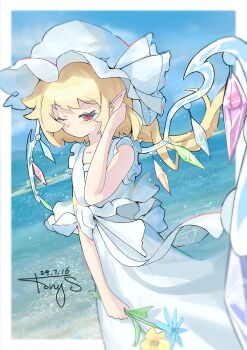 1girl absurdres alternate_costume blonde_hair blue_flower closed_mouth commentary crystal crystal_wings dated dress flandre_scarlet flower hat highres holding holding_flower mob_cap multicolored_wings ocean one_eye_closed one_side_up outdoors pointy_ears red_eyes signature solo t0nys touhou white_dress white_hat wings yellow_flower