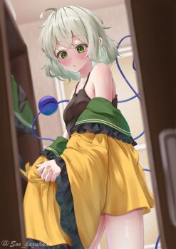 1girl absurdres ahoge black_camisole black_panties blurry blush breasts camisole commentary_request depth_of_field eyeball frilled_sleeves frills green_eyes green_hair green_skirt hat highres komeiji_koishi long_sleeves looking_at_viewer no_headwear panties shirt skirt small_breasts solo soo_kazahana third_eye touhou twitter_username underwear undressing unworn_clothes unworn_hat unworn_headwear voyeurism wide_sleeves yellow_shirt
