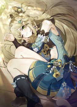 1girl :3 absurdres aqua_skirt blonde_hair bow breasts cat_girl cat_tail commentary detached_sleeves feet_out_of_frame genshin_impact green_eyes hair_bow hair_ornament hairclip highres jinbaori kirara_(genshin_impact) leg_warmers long_hair looking_at_viewer lying multiple_tails nekomata on_side one_eye_closed pawpads skirt slit_pupils smile solo stomach tail touji_(tozi526) two_tails