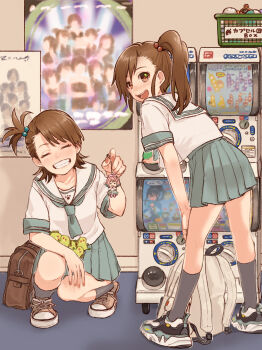 2girls backpack bag brown_hair character_doll chupacabra closed_eyes doll futami_ami futami_mami gacha_(game_mechanic) gashapon grin highres idolmaster idolmaster_(classic) idolmaster_million_live! idolmaster_million_live!_theater_days multiple_girls ponytail poster_(object) school_bag school_uniform serafuku short_ponytail siblings side_ponytail sisters smile squatting standing tanupon yumemi_riamu